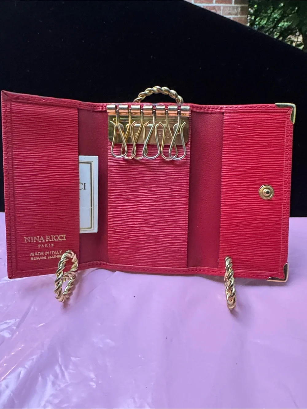 Nina Ricci Red Textured Leather key holder  with Gold Corner Accents